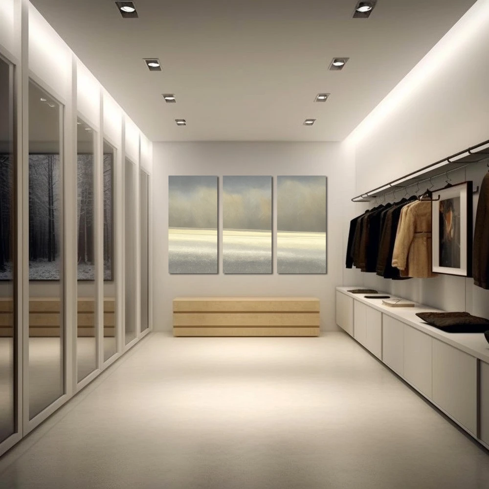 Cuadro la bruma en formato tríptico con colores gris, monocromático; decorando pared de vestidor