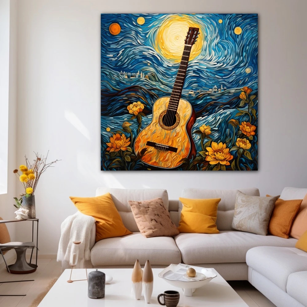 Cuadro la guitarra estrellada en formato cuadrado con colores amarillo, azul, naranja; decorando pared blanca